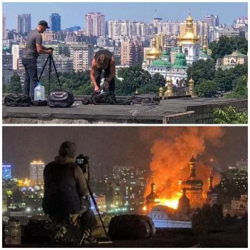 Съемка обстрелов на Украине запрещена но именно в эту ночь крышах недалеко от Киево-Печерской лавры заранее оказались фотографы с профессиональной аппаратурой